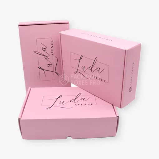 corrugated boxes printed in pink color with black text